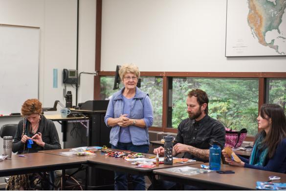 Teacher conducting class with students