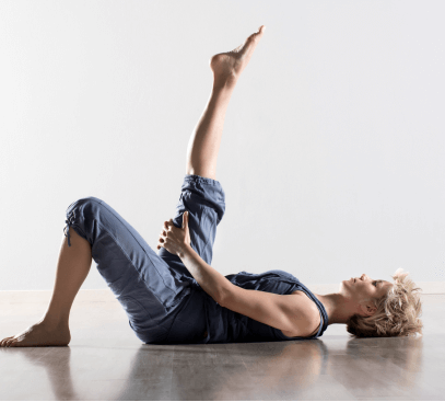 woman stretching on the floor