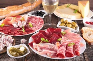 charcuterie board with white wine