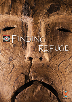 a wooden mask with the name of a film "Finding Refuge"