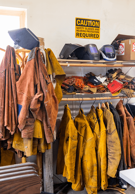 welding jackets, helmets, and gloves
