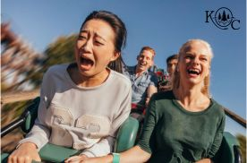 two women on a rollercoaster