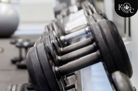 dumbbells in a rack