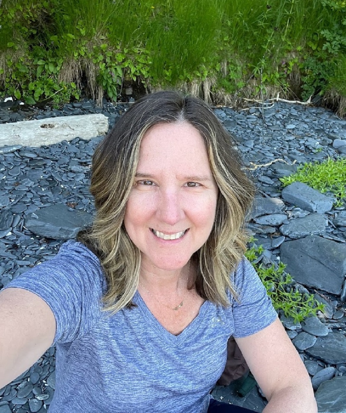 Barb brown on a rocky beach