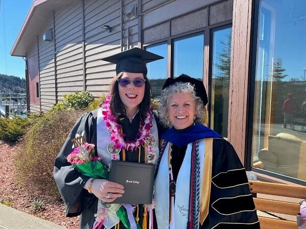 kitty deal and an education graduate at commencement